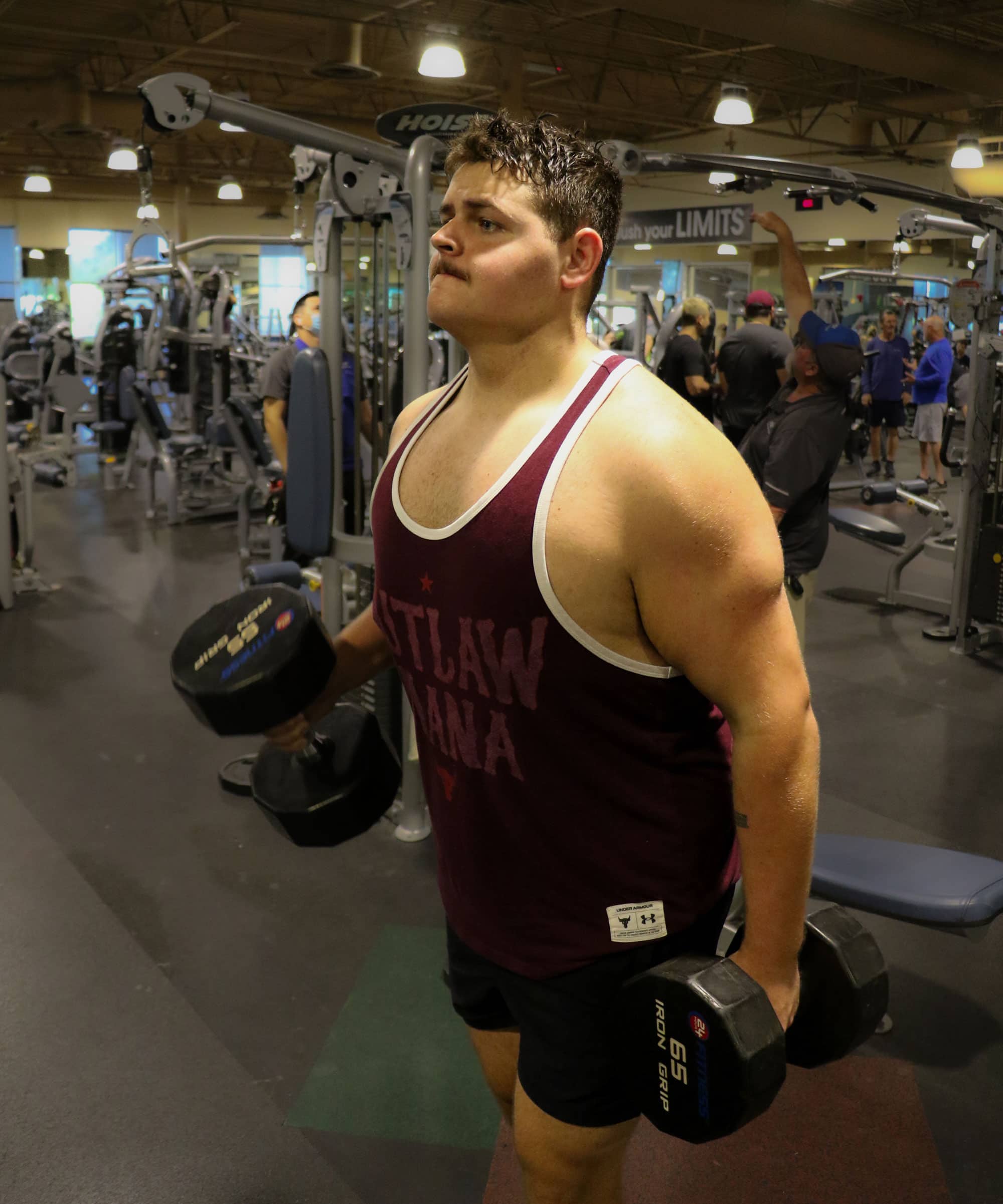 Nik lifting weights in the gym